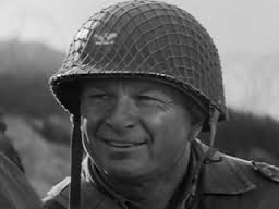 Eddie Albert als Colonel Thomson